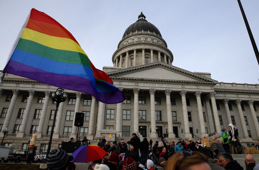 SLAT LAKE CITY, UT - JANUARY 28: Supporters hold a pro-gay marriage rally outside the Utah State Capitol on January 28, 2014 in Salt Lake City, Utah. Several weeks ago a federal judge ruled unconstitutional a voter-approved ban on same-sex marriage in the state of Utah. The ruling has since been stayed and is working it's way through the legal system. (Photo by George Frey/Getty Images)