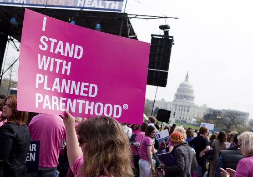 Planned Parenthood members and 20 other ally organizations hold a "Stand Up for Women's Health" rally in support of preventive health care and family planning services.
