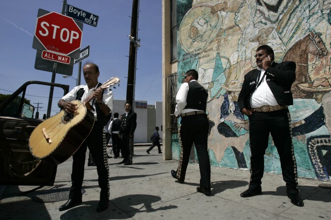 2007: Mariachis wait for work on Cinco de Mayo, at Mariachi Plaza in Los Angeles.