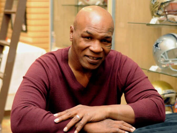 LAS VEGAS - FEBRUARY 4:  In this handout photo provided by Las Vegas News Bureau, former heavyweight boxing champion Mike Tyson attends an autograph-signing session  in the Miracle Mile Shops at Planet Hollywood Resort & Casino on February 4, 2011 in Las Vegas, Nevada. (Photo by Darrin Bush/Las Vegas News Bureau via Getty Images) *** Local Caption *** Mike Tyson