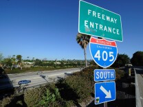 A freeway entrance sign stands near the Burbank Boulevard ramp on Interstate 405 thirty minutes before the shutdown of the freeway to demolish the Mulholland Bridge over Interstate 405 at the Sepulveda Pass on July 15, 2011 in Los Angeles, California. Los Angeles city officials are advising residents to stay home or stay away from the area during what has become known as "Carmageddon," the 11-mile shutdown of Interstate 405 for 53 hours over the weekend, for fear of massive traffic jams. (Photo by Kevork Djansezian/Getty Images)