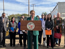 L.A. Mayor Karen Bass stands at a construction site in Boyle Heights to announce her executive order fast-tracking affordable housing approval in the city. 