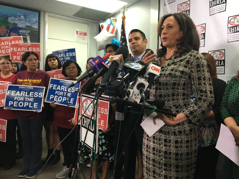 U.S. Senator-elect Kamala Harris, flanked by Long Beach Mayor Richard Garcia, holds her first post-election press conference at the headquarters of the Coalition for Humane Immigrant Rights of Los Angeles.