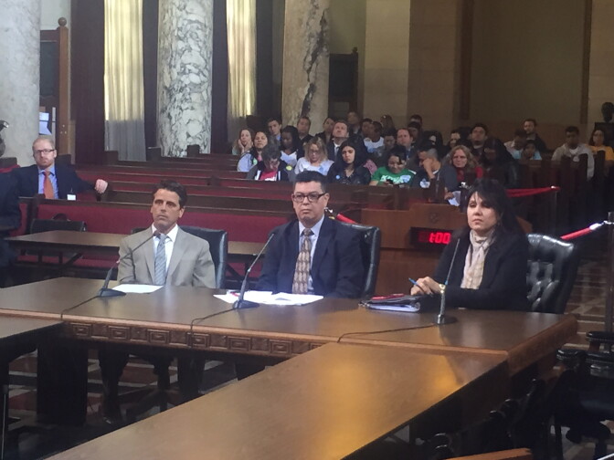 From left:  John Wickham and Roy Morales of the Los Angeles Chief Legislative Analyst's office and  Valerie Flores of the City Attorney’s office brief the L.A. City Council's Economic Development committee

