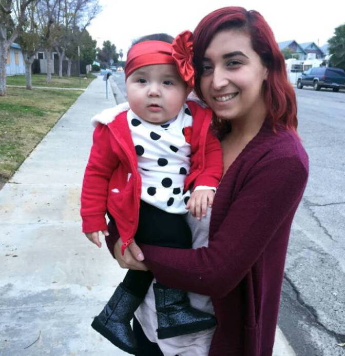 Cassandra Baca, 22, and her baby daughter, Amoriee. Baca says she’s too busy as a working single mom to think about voting.