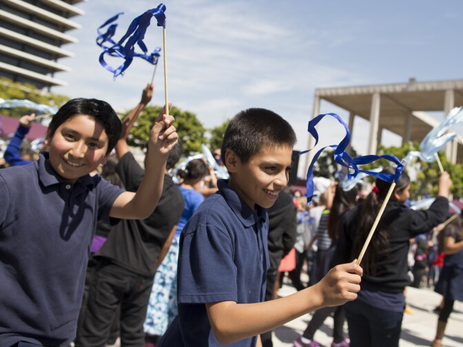 Students from Roosevelt Elementary in Pasadena take part in setting the Guinness World Records Title for the largest ribbon dance on Thursday, April 9, 2015 at The Music Center Plaza. 