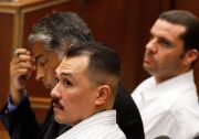 LOS ANGELES, CA, JUNE 08:  (R-L) Marvin Norwood, his attorney Victor Escobedo and co-defendant Louie Sanchez listen during preliminary proceedings in Superior Court June 8, 2012. 
