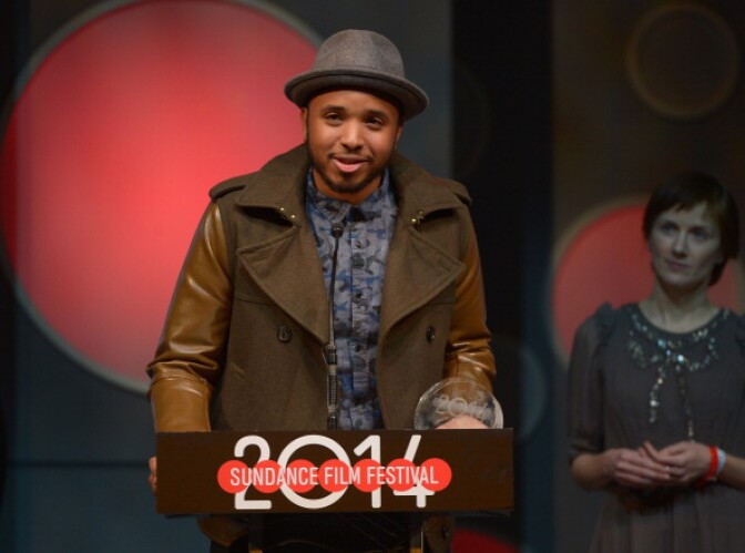 Director Justin Simien accepting the U.S. Dramatic Special Jury Award for Breakthrough Talent award at Sundance 2014 for "Dear White People"