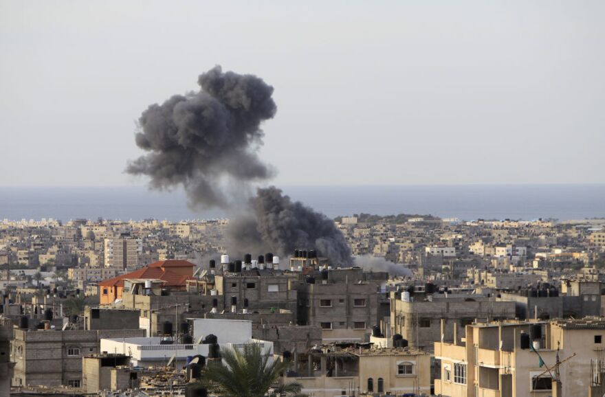 Smoke billows following Israeli air strikes in Rafah in the southern Gaza Strip on November 16, 2012. Israeli officials said the Jewish state was preparing to launch its first ground offensive in four years into the Gaza Strip and the army started calling up reservists. 