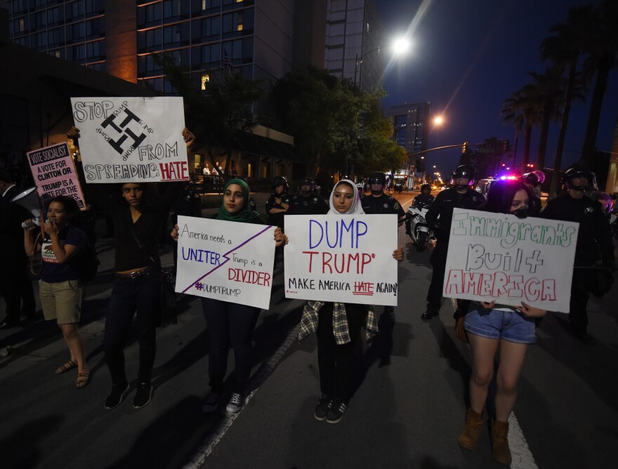 Anti-Trump protesters demonstrate outside the convention center where Republican presidential candidate Donald Trump held an election rally in San Jose, California on June 2, 2016. 

