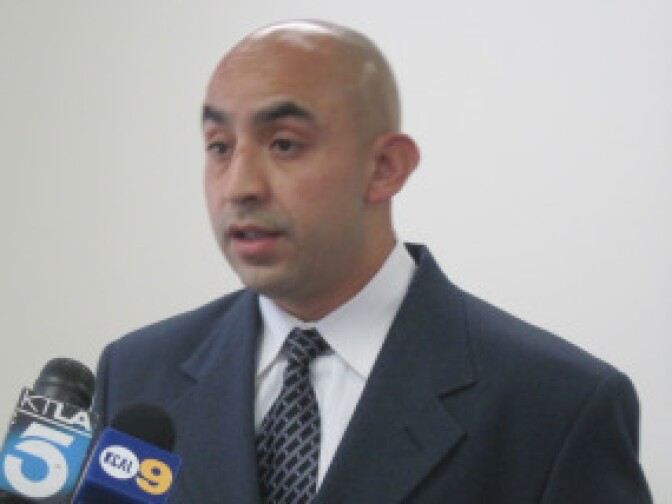 Manuel Gallegos, who recorded a YouTube video showing LAPD officers hitting bike riders with batons, holds a press conference to announce his claim against the LAPD in Downtown Los Angeles on June 4, 2010.