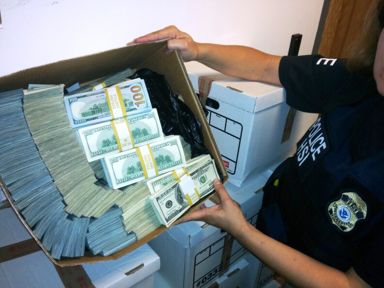 Homeland Security Investigations seized in excess of $65 million in cash Wednesday morning during a coordinated multi-agency bust of LA fashion industry companies accused of links to money laundering schemes associated with Mexican drug cartels.