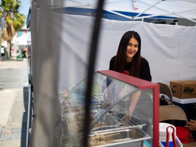 Iririn Sririda, the owner of a Thai food stall, So Zaap,  photographed at the East Hollywood Farmer's Market on Hollywood Boulevard on June 6, 2019 in Los Angeles, California. (James Bernal for KPCC)