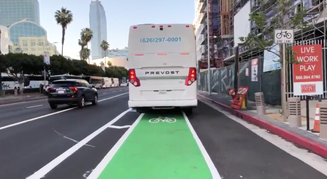 A video from cyclist Matthew Vitale shows a line of idling charter buses blocking the new bike lane on Figueroa Street. The LA Department of Transportation is doing outreach with local businesses and the LAPD has upped enforcement to try to clear vehicles from the lane.
