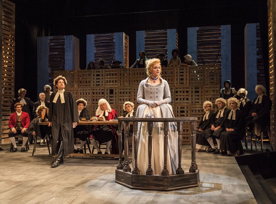 Lucie Manette (Emily Goss) testifies in Darnay’s trail in England with the cast of A Noise Within's "A Tale of Two Cities."