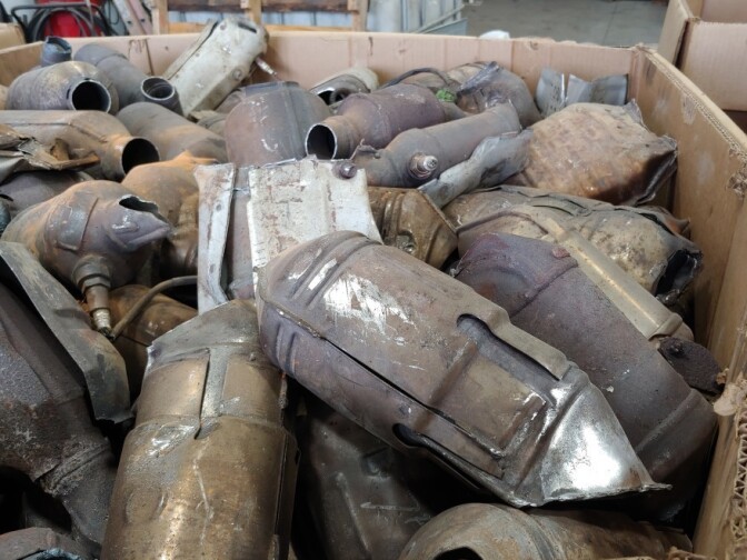 A bin full of discarded catalytic converters at AB CatTech in Burlington, Wis.