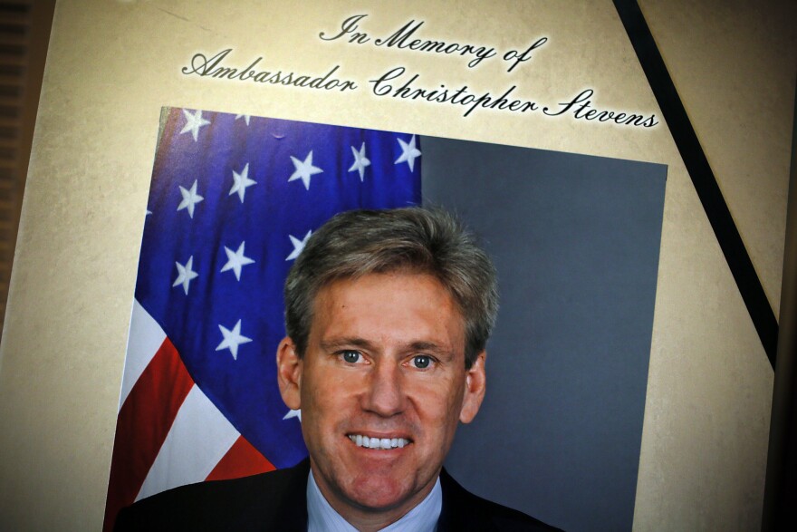 A portrait of Ambassador J. Christopher Stevens is placed along with a condolence book outside the room of Senate Foreign Relations Committee at the U.S. Capitol September 14, 2012 in Washington, DC. Ambassador Stevens and three other Americans were killed in an attack on the U.S. Consulate in Benghazi, Libya on September 11, 2012.