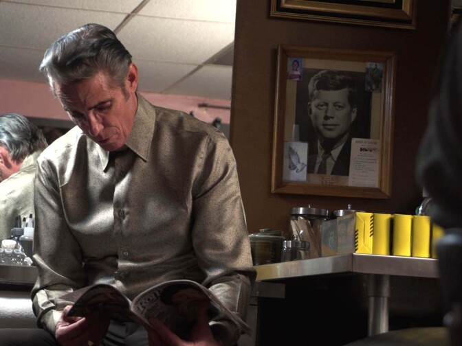 Legendary tattoo artist Mark Mahoney in his Shamrock Social Club tattoo shop on Sunset Blvd.  