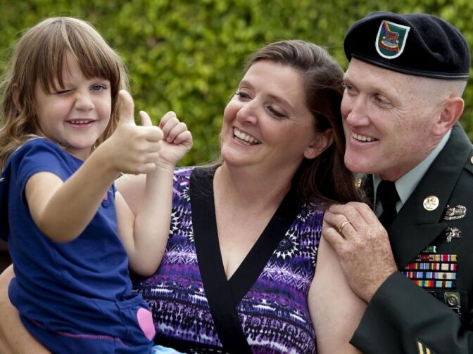 First Sergeant Tim McCoy, daughter Sami and wife Amy