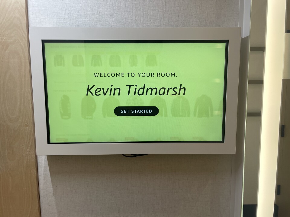 A LED sign that says "Welcome to your room, Kevin Tidmarsh. Get started"