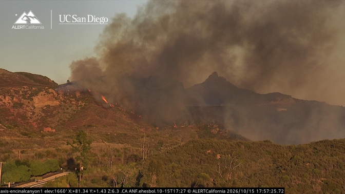 Bryson Fire near Malibu — AlertCalifornia camera image AlertCalifornia camera view of smoke and flames on the hillside during the Bryson Fire in Malibu