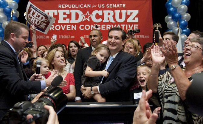 Holding his daughter Caroline, U.S. Senate candidate Ted Cruz and and his wife, Heidi, holding their daughter, Catherine, appear before a cheerful crowd after Cruz defeated Republican rival, Lt. Gov. David Dewhurst in a runoff election  for the U.S. Senate seat vacated by Kay Bailey Hutchison Tuesday, July 31, 2012, in Houston.  (AP Photo/Houston Chronicle, Johnny Hanson) MANDATORY CREDIT