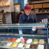 BERLIN, GERMANY - MARCH 25: Felix, owner of Süssfein, packs ice cream into containers to be delivered for online orders on March 25, 2020 in Berlin, Germany. Small business are trying to cope with the COVID-19 pandemic with online, pick up or take-away orders. (Photo by Maja Hitij/Getty Images)