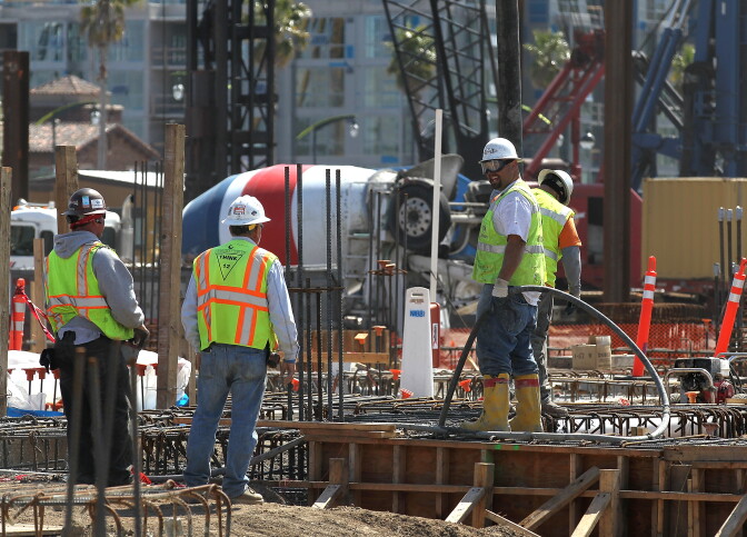 SAN FRANCISCO, CA - MARCH 23:  Workers pour concrete at the construction site for the Channel Mission Bay housing development on March 23, 2012 in San Francisco, California. After years of being dormant, new apartment construction in the city of San Francisco is set to take off as the city's technology sector continues to grow. Nearly 22,000 apartment units are currently in various stages of permit approvals and construction.  (Photo by Justin Sullivan/Getty Images)