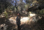 Shannon O'Sullivan in a dry creek within the Hahamongna Watershed Park in Pasadena. She objects to trees being cleared from part of the park to make way for sediment removal behind Devil's Gate Dam.