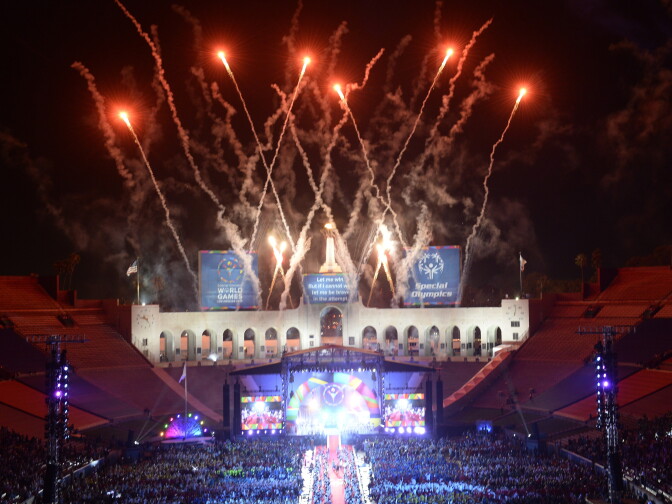 Fireworks explode over the Los Angeles Memorial Coliseum during the 2015 Special Olympics World Games Opening Ceremony, July 25, 2015 in Los Angeles, California.  The Special Olympics, the world's largest sports organization for children and adults with intellectual disabilities, will be the single largest event in Los Angeles since the 1984 Olympics, with more that 7,000 athletes from 165 countries participating. AFP PHOTO / Robyn Beck        (Photo credit should read ROBYN BECK/AFP/Getty Images)