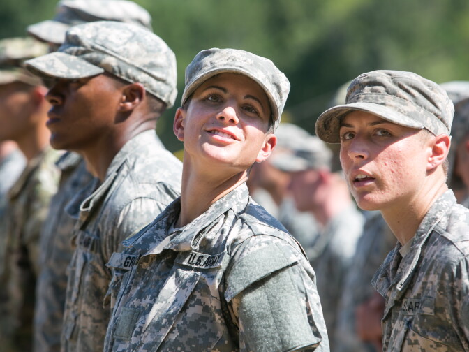 Capt. Kristen Griest (left) and 1st Lt.  Shaye Haver look on during the graduation ceremony of the United States Army's Ranger School on August 21, 2015 at Fort Benning, Georgia . Griest and Haver are the first women ever to successfully complete the U.S. Army's Ranger School. 