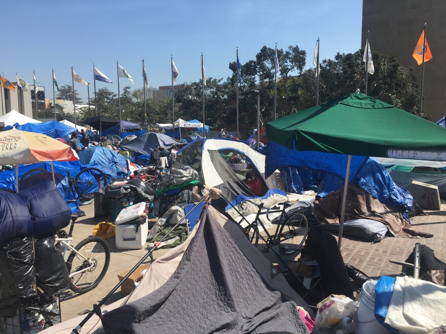 A view of the homeless encampment in Santa Ana’s Plaza of the Flags. U.S. District Judge David Carter has told Orange County it needs to help relocate people living in the area.
