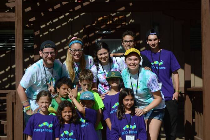Claire Witzke (in the yellow cap) as a counselor at Camp Kesem USC 2014.