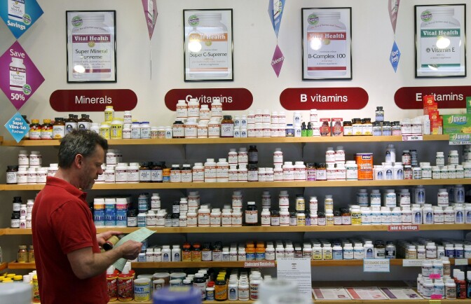 SAN FRANCISCO - APRIL 06:  Don Olufs checks inventory of vitamins and diet supplements at Vibrant Health April 6, 2009 in San Francisco, California. As the economy continues to falter, many Americans are buying vitamins and health supplements in an attempt to stay healthy and avoid paying high medical bills.  (Photo by Justin Sullivan/Getty Images) *** Local Caption *** Don Olufs