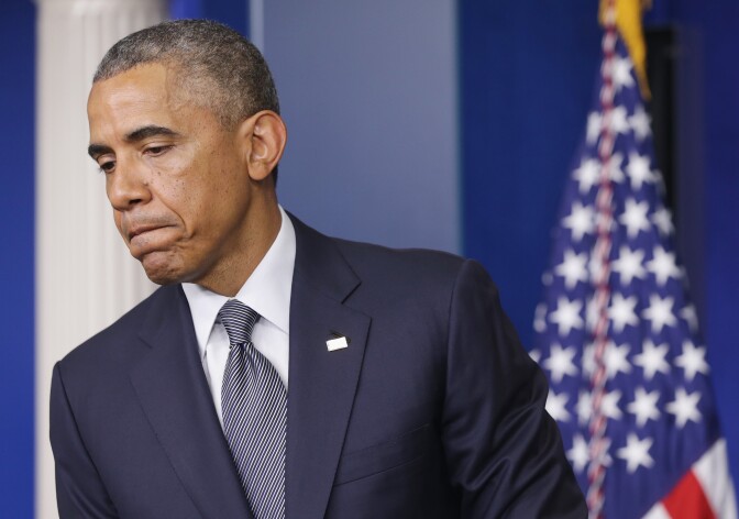President Obama pauses while delivering a statement on the Malaysia Airlines crash over eastern Ukraine in the Brady Press Briefing Room of the White House July 18, 2014 in Washington, DC. Malaysia Airlines flight MH17 travelling from Amsterdam to Kuala Lumpur was allegedly shot July 17 on the Ukraine/Russia border near the town of Shaktersk. 