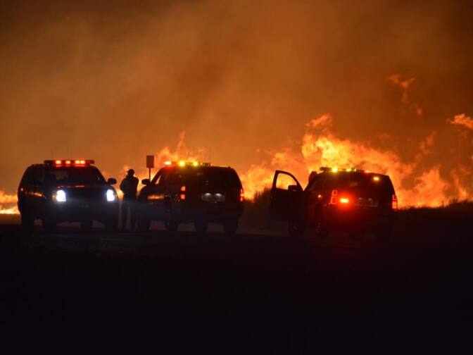 A photo from the Kern County Fire Department shows a new wildfire that broke out late Thursday, June 23, 2016, quickly tearing through dozens of homes and prompting evacuations.