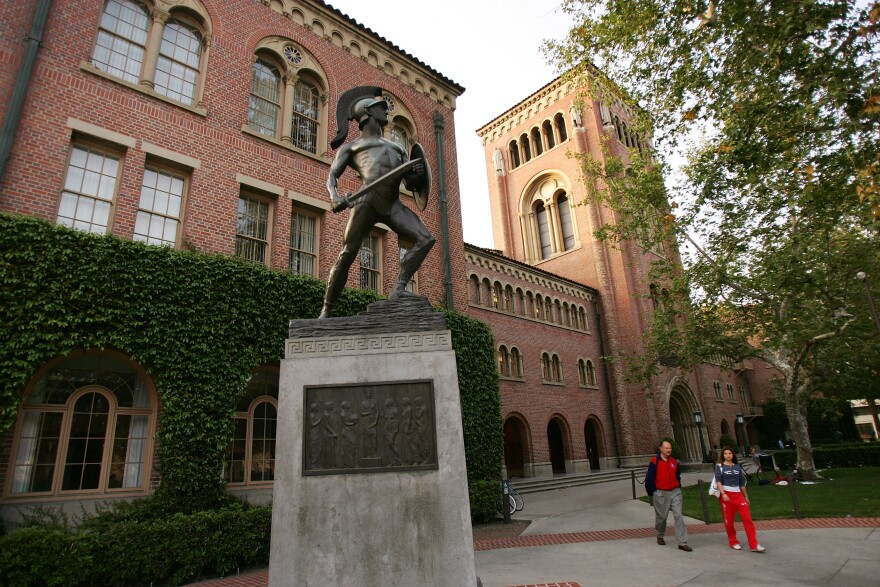 LOS ANGELES, CA - APRIL 06: A statue of the school mascot, the Trojan, stands on the campus of the University of Southern California (USC) on March 6, 2007 in Los Angeles, California. A growing investigation by New York State Attorney General Andrew M. Cuomo into the relationships between student loan companies and universities reports that financial aid directors at USC, Columbia University, and the University of Texas at Austin allegedly held shares in a student loan company recommended by each university, yielding significant profits for the directors. One of the directors made more than $100,000, according to Cuomo's office. (Photo by David McNew/Getty Images)