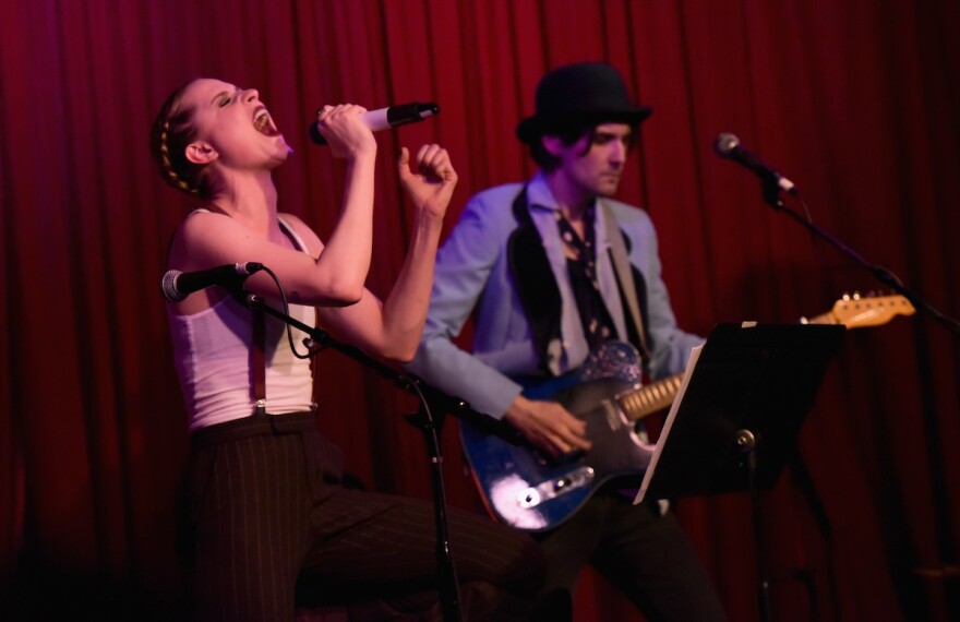 Evan Rachel Wood, Zane Carney And Paul McDonald Perform At The Hotel Cafe, Wood sings in this photo with Carney on Guitar.