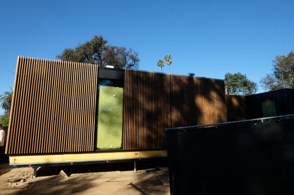 A prefabricated home waits to be put into place.