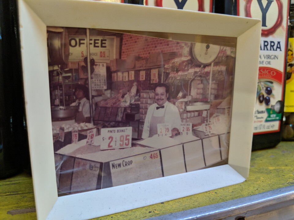 A picture of Celestino Lopez, ca. 1980, at his stall Chiles Secos at Grand Central Market. He opened it in 1975, and his family has continued to operate it after his death in 2008.