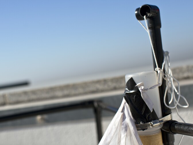 Insects that attempt to fly out of the malaise trap will go through this pipe and eventually fall into a container of alcohol. Dr. Brian Brown, curator of entomology at the Natural History Museum, is curious to see if insects treat skyscrapers like mountains.