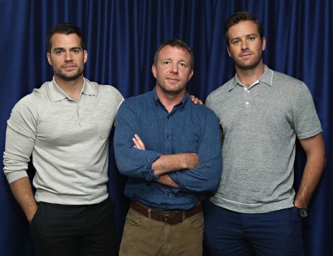 Actor Henry Cavill, director Guy Ritchie and actor Armie Hammer pose for a photo during SiriusXM's Entertainment Weekly Radio 'The Man from U.N.C.L.E.' Town Hall with Guy Ritchie, Henry Cavill and Armie Hammer on August 12, 2015 in New York City.  