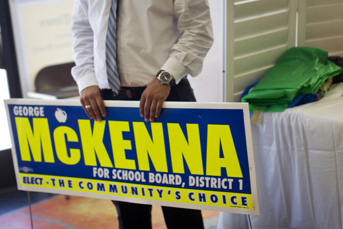 Campaign workers organize materials for George McKenna at his campaign headquarters on Aug. 1. The retired principal and administrator was elected to the Los Angeles Unified school board in a runoff Tuesday.