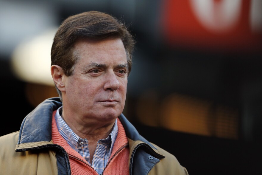 File: Former Donald Trump presidential campaign manager Paul Manafort looks on during Game Four of the American League Championship Series at Yankee Stadium on Oct. 17, 2017 in the Bronx borough of New York City.