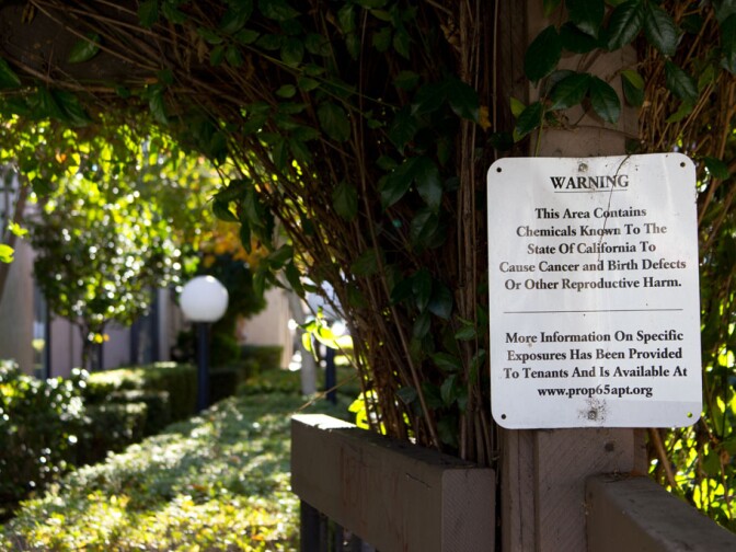 A sign posted at a Sacramento apartment complex warns of harmful chemicals on the premises, as required by Prop. 65.