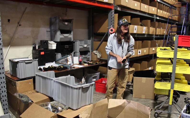 A member of the Green Vets program preparing orders.