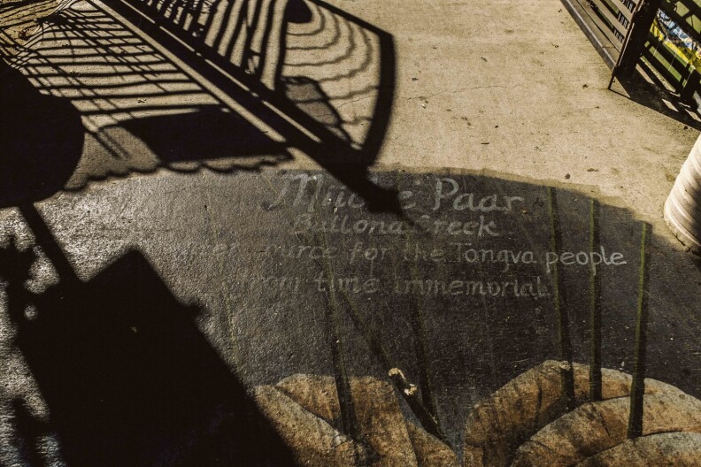 A sign posted near the Ballona Creek Bike Path access point at Duquesne Ave.