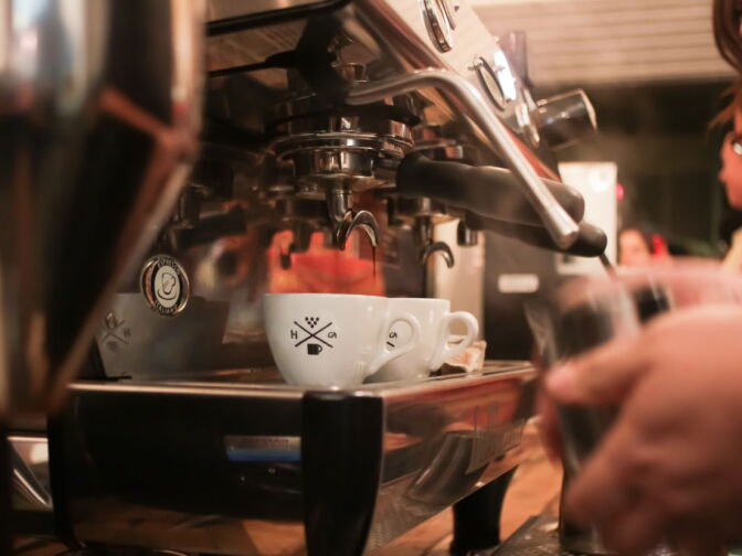 Espresso shots are pulled into the competitors’ cups.