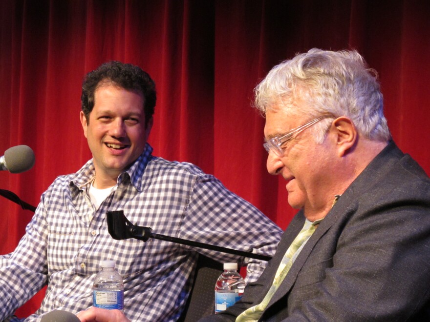 Michael Giacchino laughs at one of Randy Newman's responses.