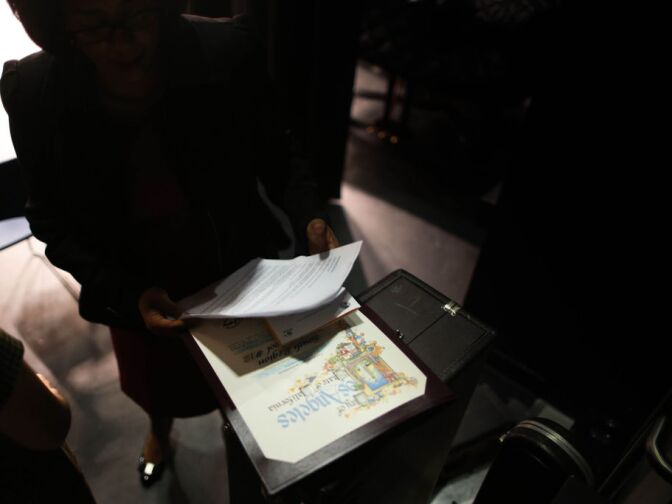 Mayoral Candidate Jan Perry looks over notes for her speech to students at the school's ribbon cutting. The councilwoman used downtown projects to spur economic development in the poorer parts of South Los Angeles.